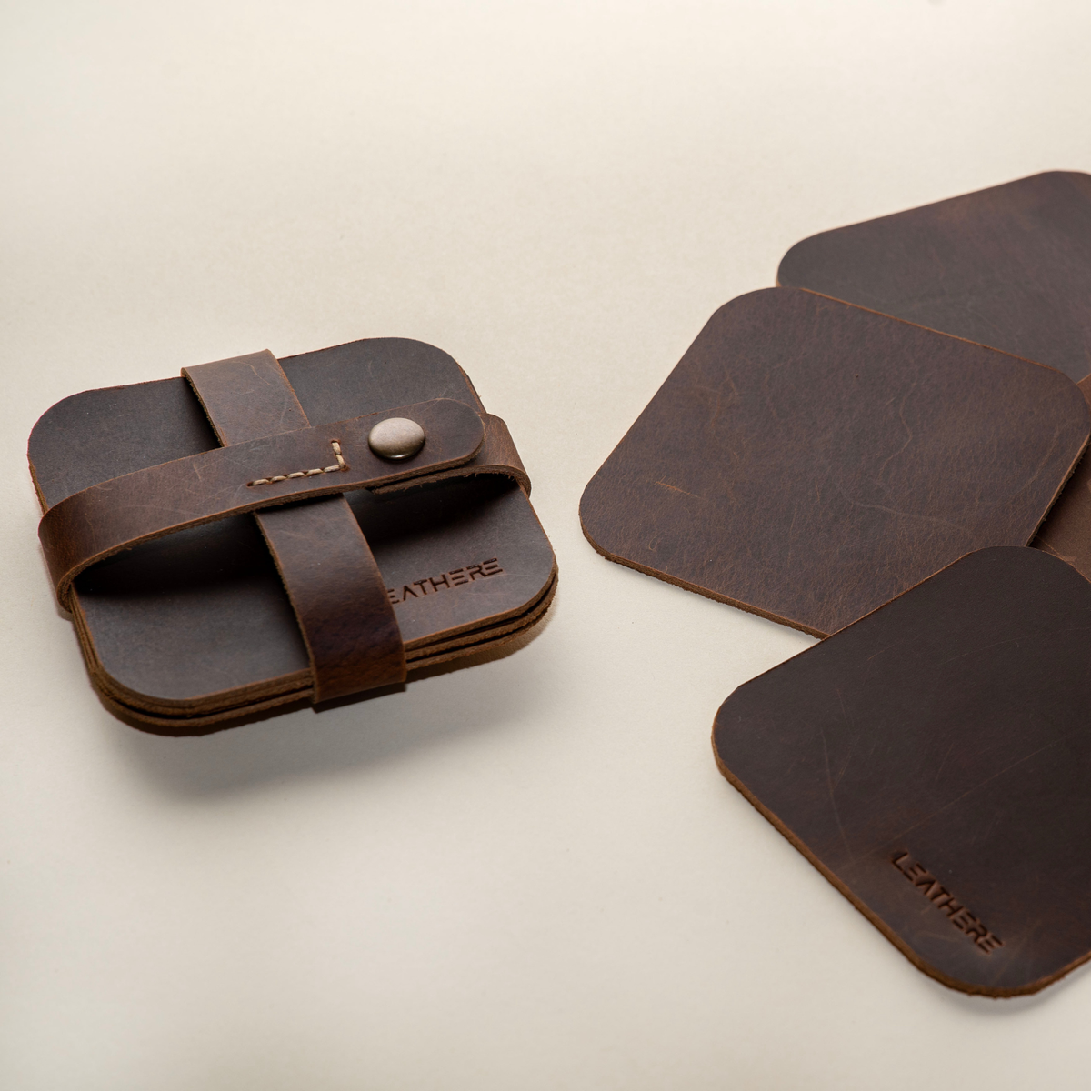 Leather Coffee Coaster Set, Hialeah, stacked and bundled with strap