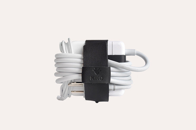 Black leather MacBook cord wrap on desk, Kiko Leather