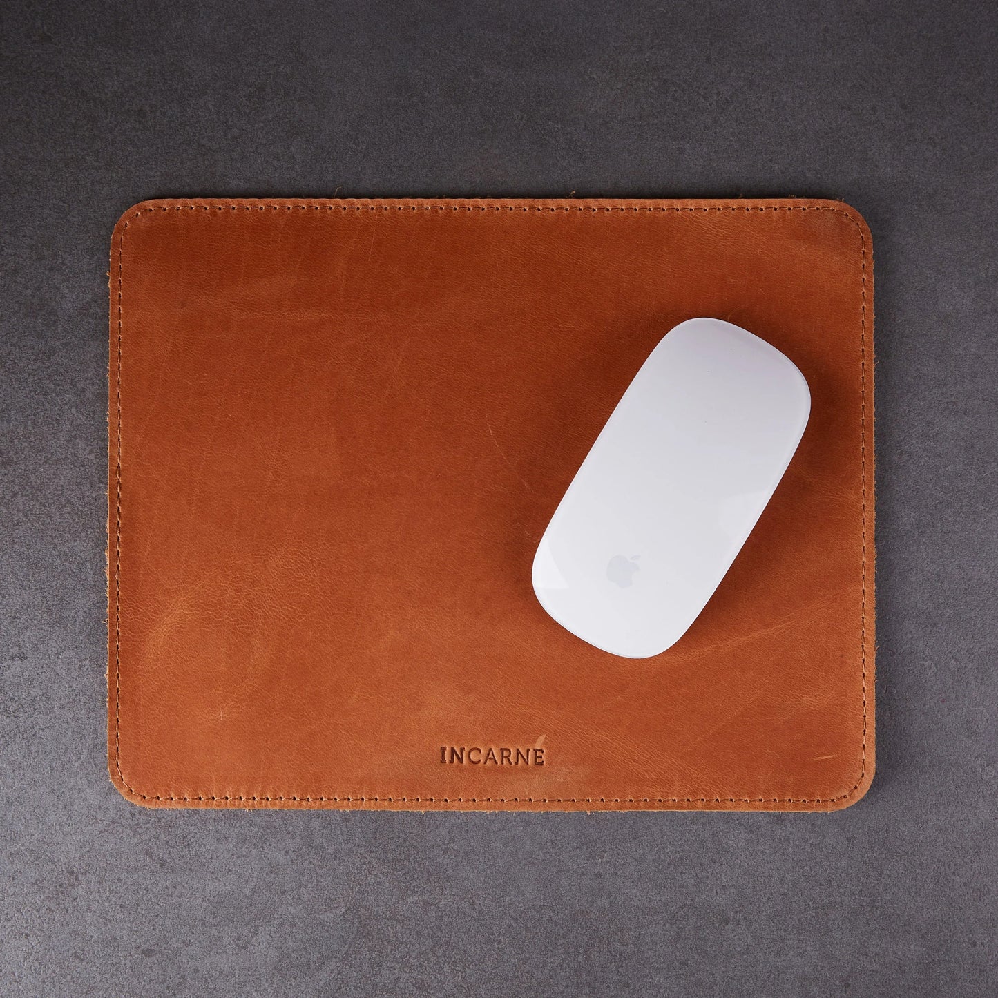 Cognac leather mousepad on desk, INCARNE