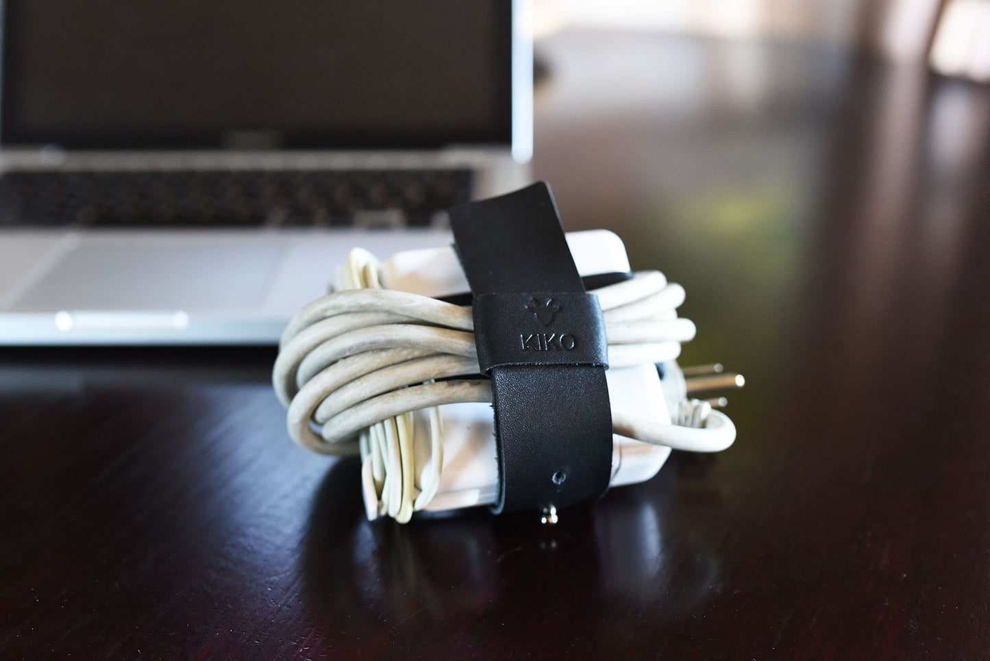 The Cord Lord — Black Leather Cable Wrap