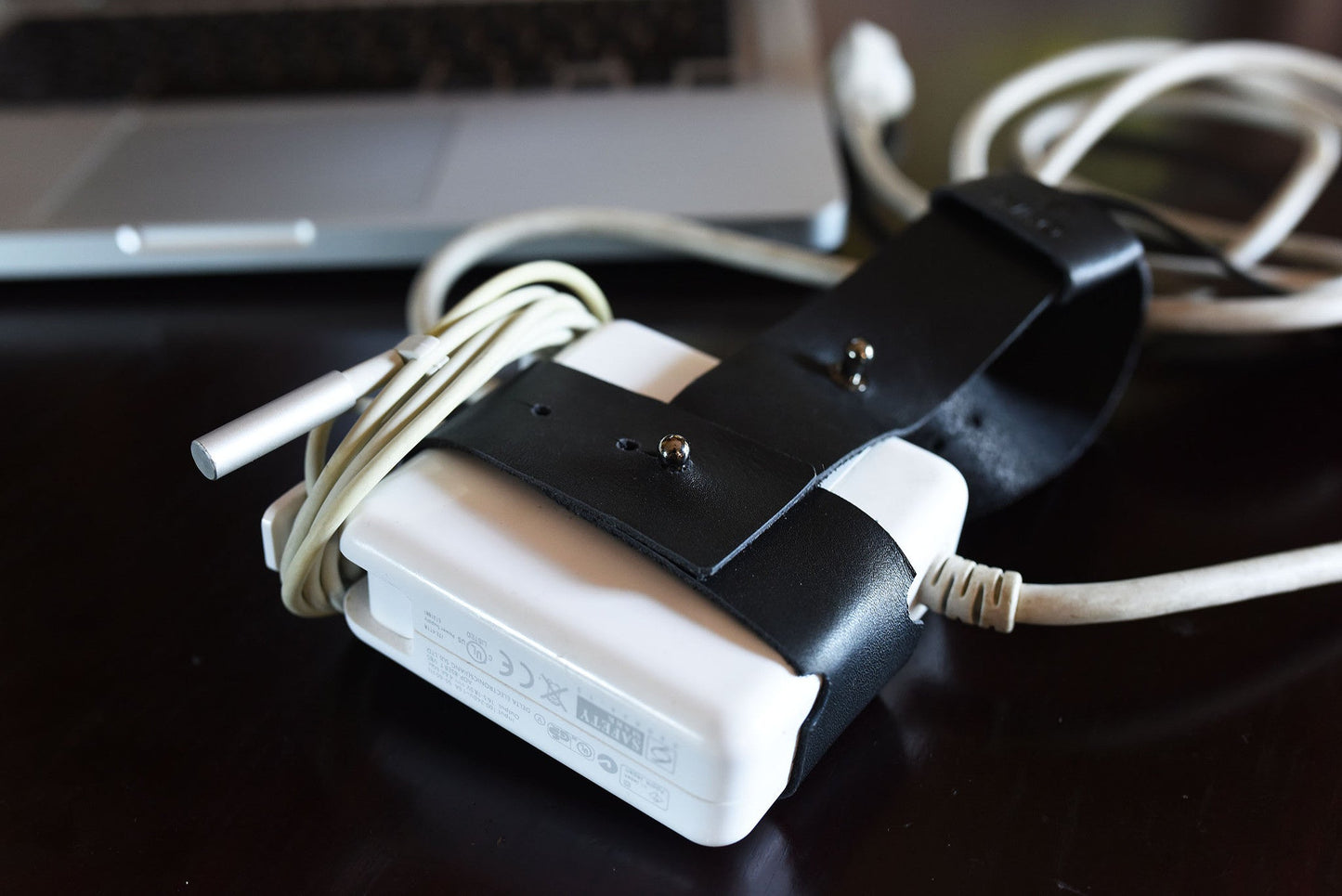 The Cord Lord — Black Leather Cable Wrap